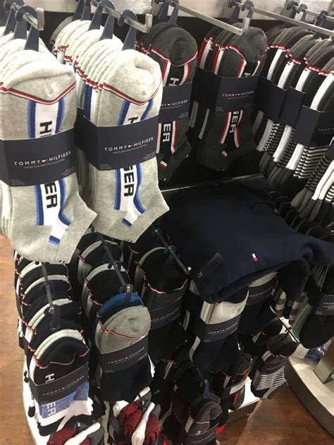 Tommy Hilfiger Carries Mens Fashions at Wrentham Village .